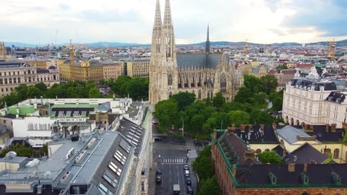 Aerial frontal travel to Votive Church in Vienna, Austria.
