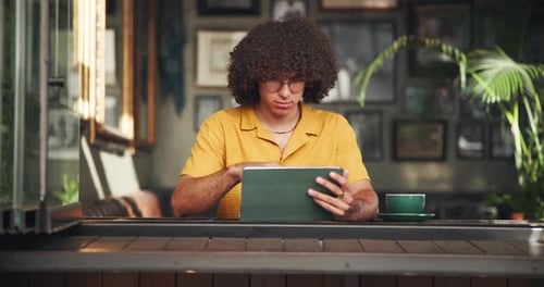 Coffee shop, student and man on tablet for online project, digital learning