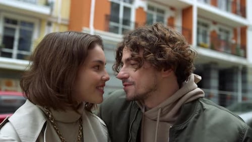 Love Couple Touching Noses on Urban Street. Affectionate Lovers Kissing on City