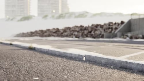Empty Beach Car Park Spaces Covered in Asphalt