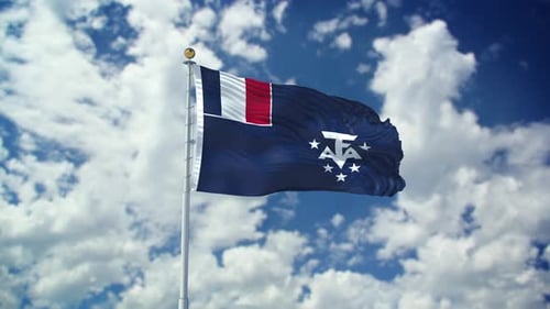 Realistic French Southern and Antarctic Lands Flag Waving in Blue Sky