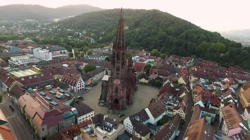 4k Drohne Footage shot near the Cathedral in, Fraiburg im Breisgau, Germany at Sunrise.