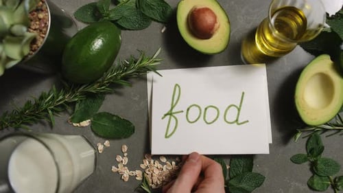 Healthy Food Ingredients with Avocado and Fresh Herbs
