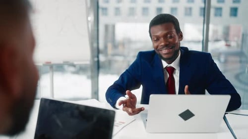 Talk of Two Business Partners in Office African American and Caucasian Men Black Male Office Worker