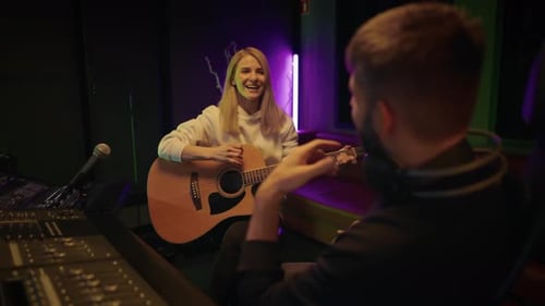 Audition in Recording Studio Talented Lady Guitarist Singing Song and Playing Musical Producer Man