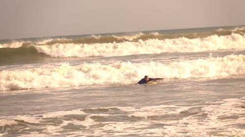 Young Man Surfing on Board in Sea, Super 240