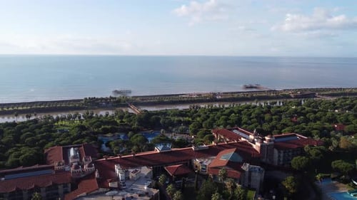 Forest and sea view backwards from hotel with drone 4k