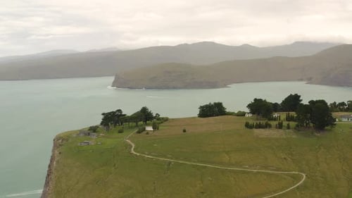 Passarela à beira-mar, erro de Taylor, Nova Zelândia, vista aérea da praia Taylor's Mistake a partir de Godley