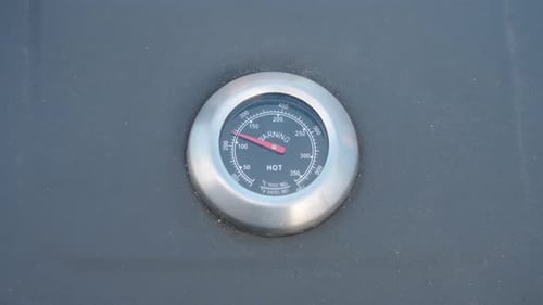 Rising temperature on grill thermometer