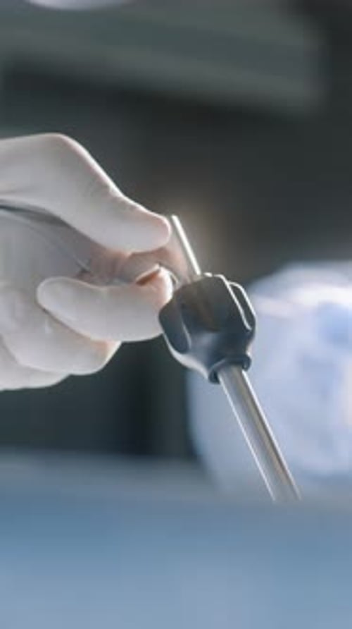 Surgeons Perform Operation Using Surgical Tools