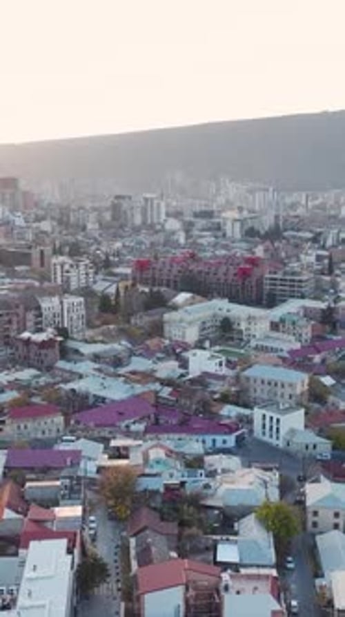 Vertical Video Aerial Majesty Tbilisi Georgia's Most Beautiful City in Autumn