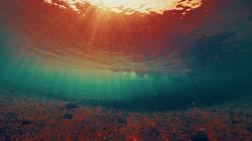 Underwater view of the breaking ocean wave