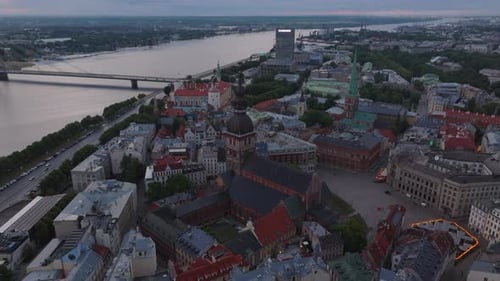Riga Cathedral Dome Square and Houses in Old Town Aerial Shot of Historic Tourist Sights at Dusk