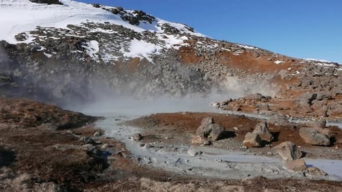 Steam rising from the ground due to geothermal activity. Iceland