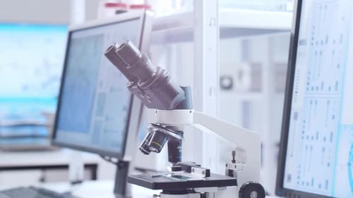 Laboratory Microscope in a Brightly Lit Research Environment