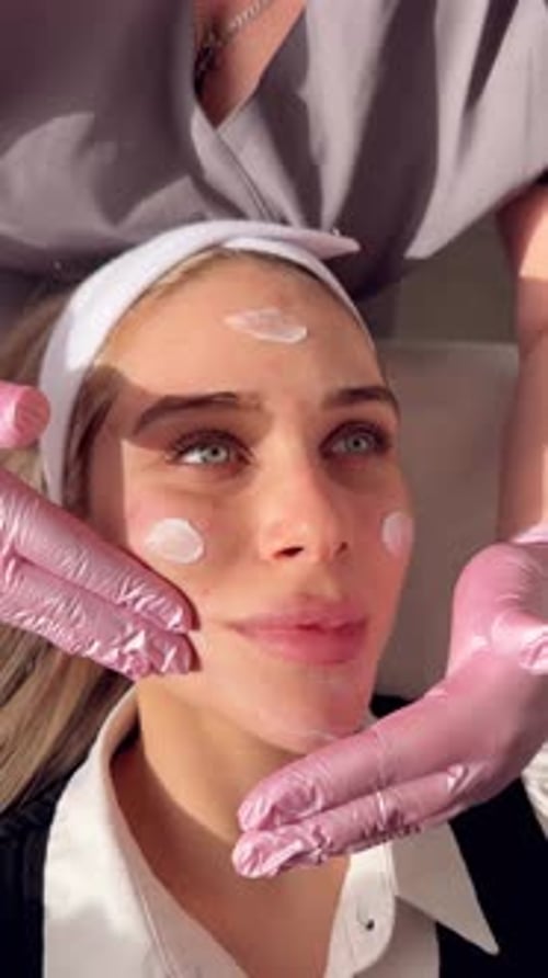 Facial Rejuvenation Treatment with Cream at the Spa