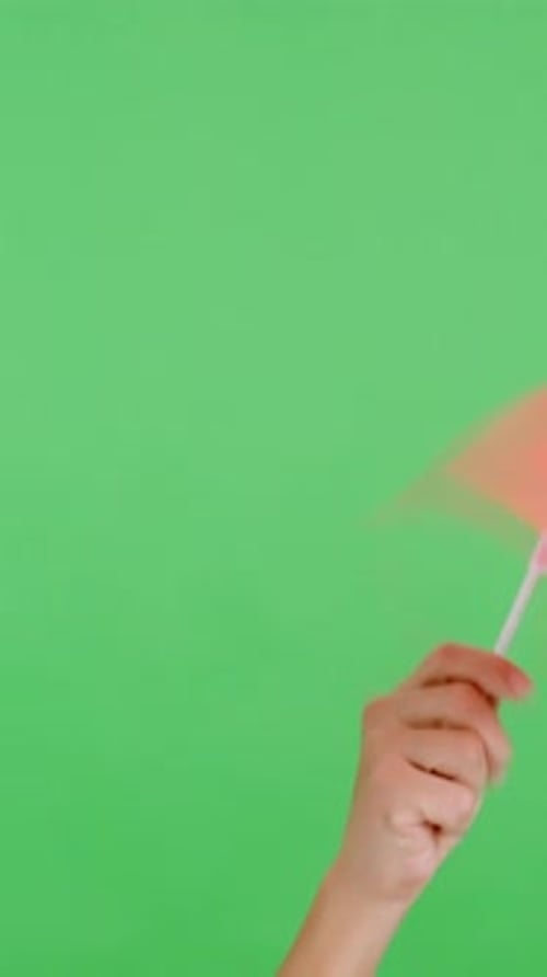 Arm waving Chinese Flag in Front of Green Screen