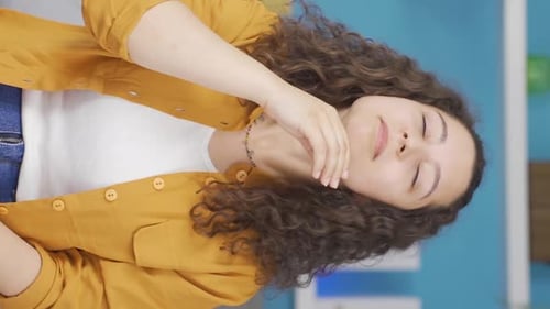 Vertical video of The sneezing young woman. Patient.