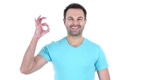 Smiling Man Giving Ok Hand Gesture on White