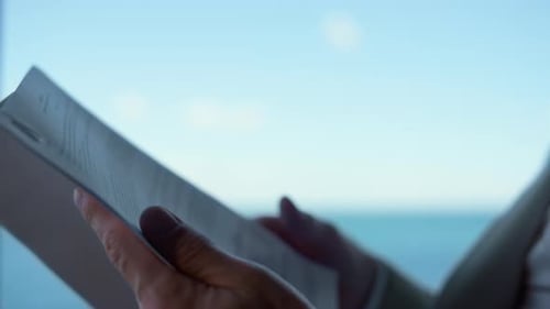 Professional Hands Flipping Reading Contract Closeup. Unknown Lawyer Study Papers at Ocean