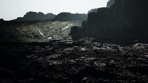 Rocky Terrain With Rocks and Grass