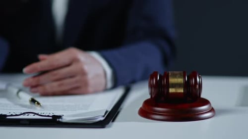 Gavel and Legal Document in Office Setting