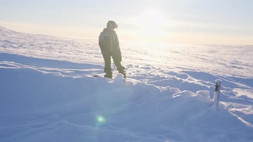 Boy's Adventure Snowboarding Under The Sun