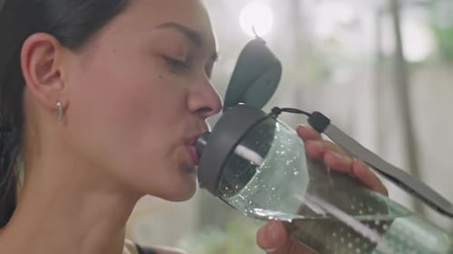 Woman Drinking Water Close Up Refreshing