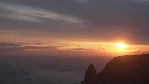 Sunset Sky Clouds Timelapse Red Burning Sunset Over Sea and Golden Shining Water Surface with Bokeh