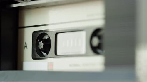 Analog Audio Cassette Tape inside Player Close Up