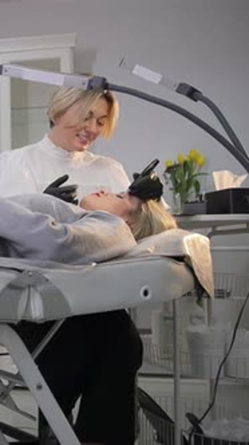 Woman Getting Beauty Treatment at Salon