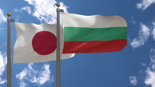 Japan and Bulgaria Flags Waving Together on Flagpoles