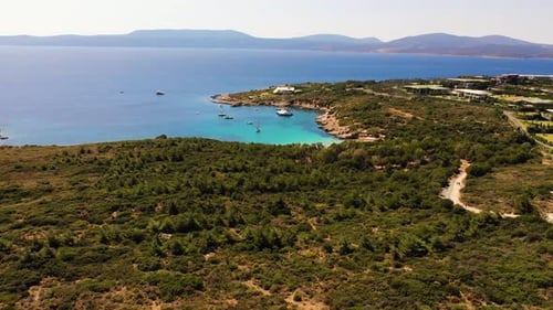 People swimming in the sea and sunbathing on the beach on the Turkish coast