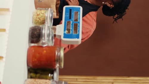 Store Clerk Weighs Food at Shop