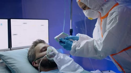 Doctor And Infected Patient In Hospital, Coronavirus Concept.