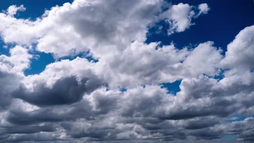 Clouds Drifting in a Beautiful Blue Sky