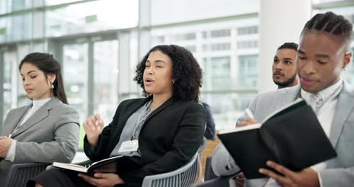 Adults Attend Conference in Modern Auditorium