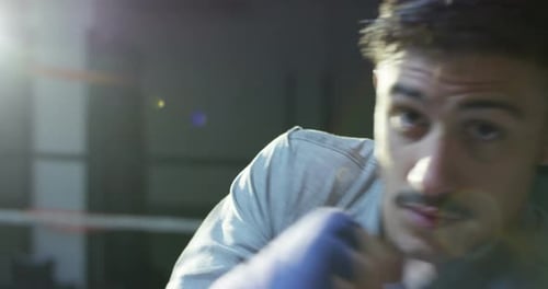 Close Up of Man Boxing in Ring