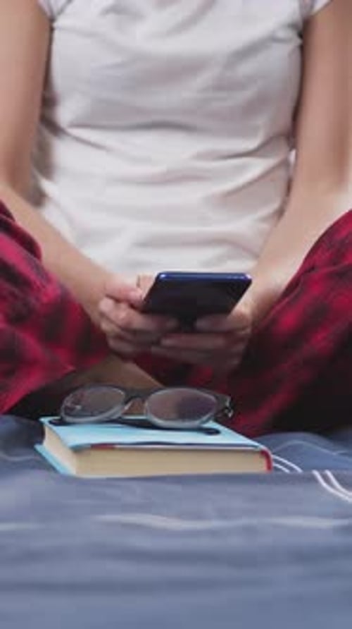 Attractive Carefree Satisfied 30Aged Brunette in Sleepwear Taking Interesting Book to Read After