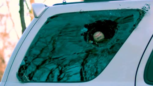 Baseball Smashes Car Window in a Breaking Accident