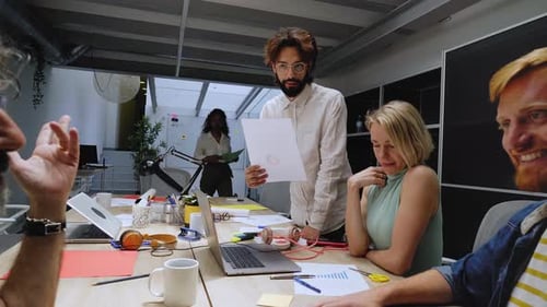 Diverse Team Business Professionals Gathered in Office Conference Room