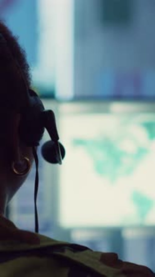 Vertical Video Woman Military Personnel Tracking Enemy Vessels on the Coast Line Territory
