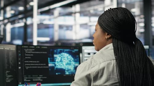 Data Center Worker Analyzes Datasets Using Deep Learning Node Tree Programming