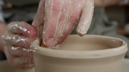 Clay Forming on a Pottery Wheel with Hand
