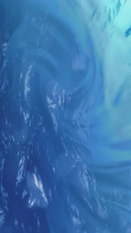 Abstract Blue Fluid Swirl Background