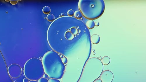Abstract Macro Footage of Floating Blue Bubbles