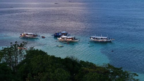 Gorgeous sunset over a peaceful island, captured from a breathtaking aerial perspective.