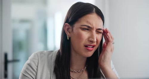 Business, woman and headache in office for burnout or pressure in workplace
