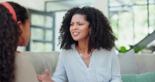 Argument Between Two Women at Home During Daytime