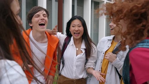 Group of Multiracial Young Students Having Fun Standing Together on College Campus Scholarship